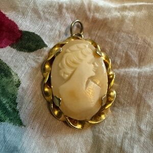 Elegant Gold Cameo Pendant